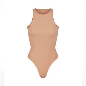 SKIMS FITS EVERBODY HIGH NECK BODYSUIT.  COLOR OCHRE
